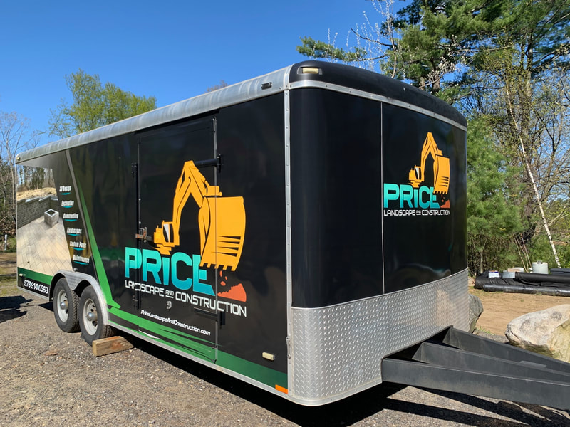 Price Landscape branded trailer with large logo and services