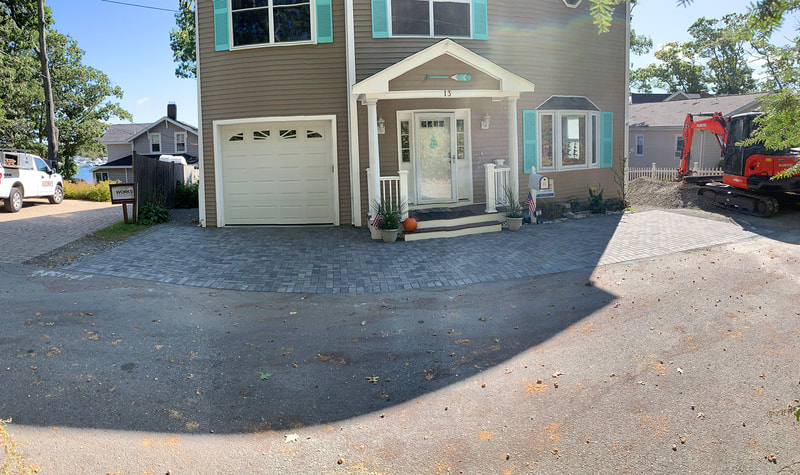 Stone paver driveway finished project